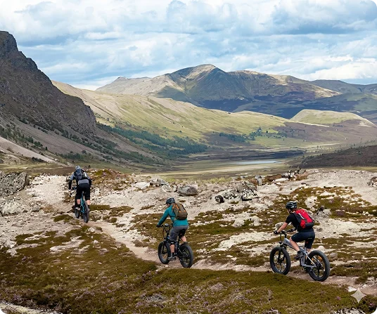 Enwolt e-bike riders on mountain trail